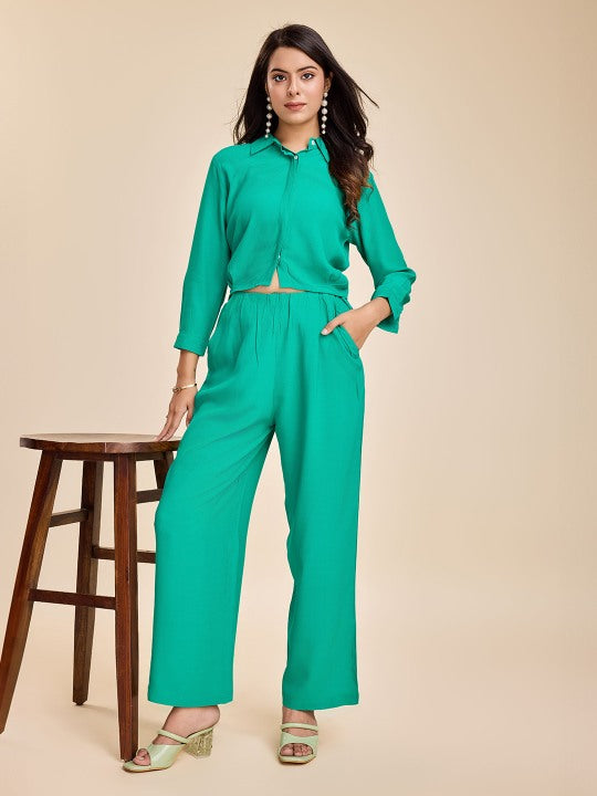 stylish crop shirt with long puffed cuff sleeves, back cutout tie-up &  pants set in Moroccan Crepe - Green