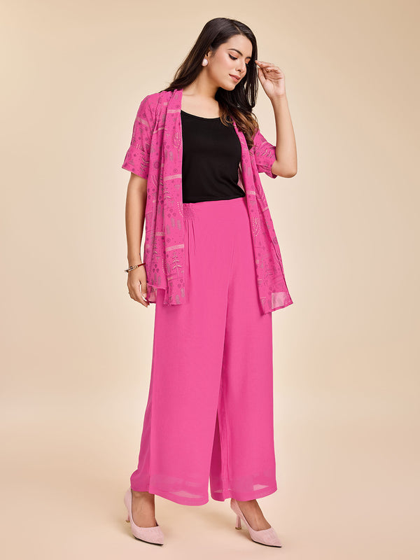 elegant printed short sleeve shrug, a plain comfortable flared pants with smocking at back & a plain black bustier  set in Georgette - Pink