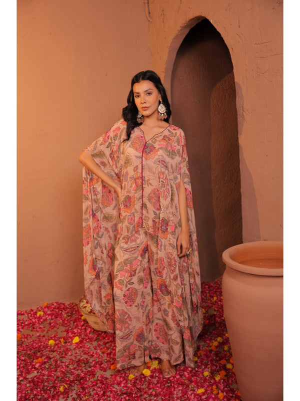 stylish viscose georgette hand embroidered cape along with front cross flared smocking pant - Peach