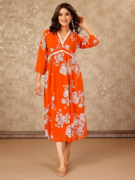 floral print alia cut viscose  georgette  dress with thread tassle lace , hand embroidery on neck & yoke - Orange