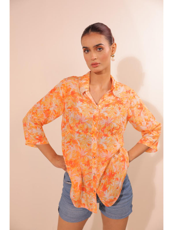 natural crepe abstract printed,  mandarin hand embellished collar stylised gathered busted top with three fourth sleeve. - Orange