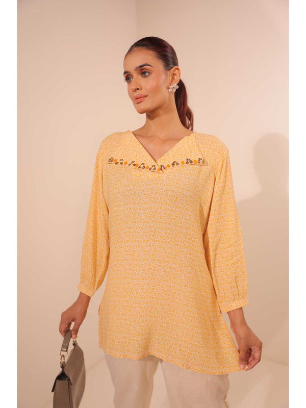 cheerful royal crepe viscose printed hand embellished overlapped V neck lapel collared,  with three fourth puff sleeve top. - Yellow