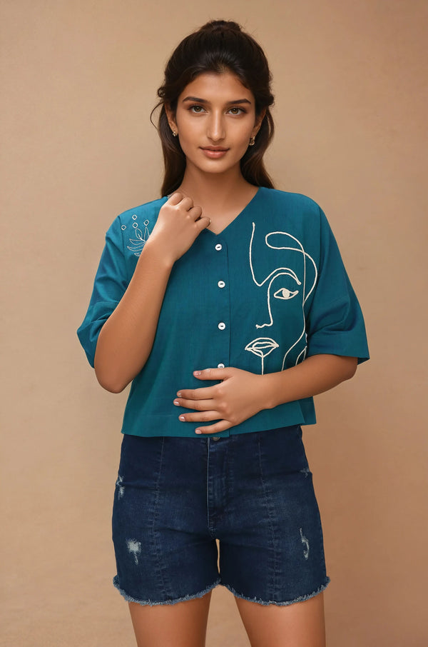 Komarri U Contemporary cotton vneck top with flared sleeves, buttoned fron with artistic face line embroidery -Blue