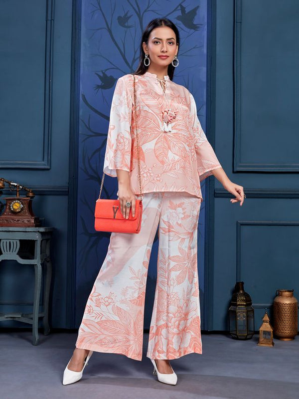 stylish monochromatic floral printed pure viscose natural crepe flare sleeves and mandarin collar neck tie-up drawstrings with tessels top pared with comfortable flare pants set - Peach